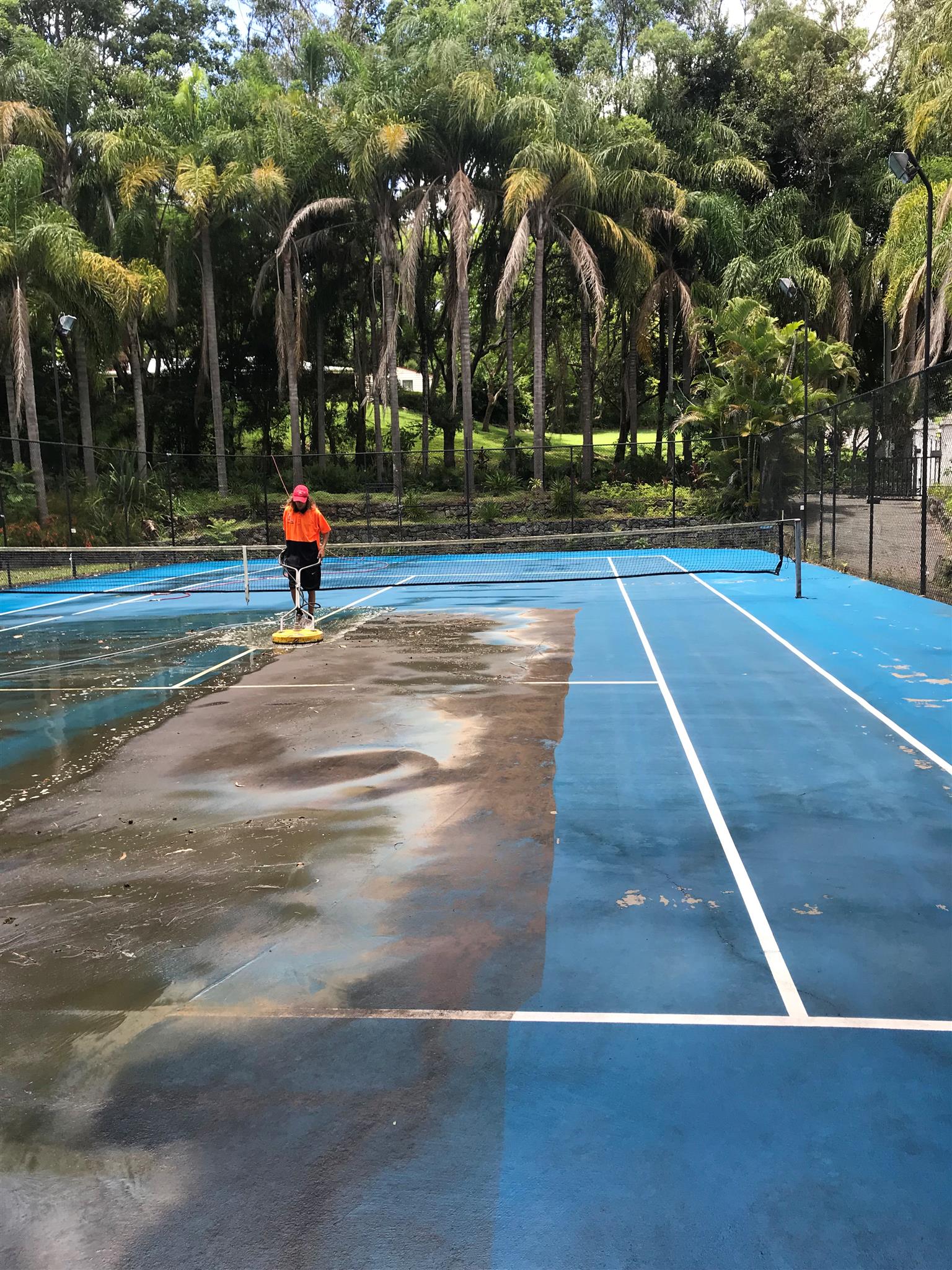Pressure cleaning tennis court